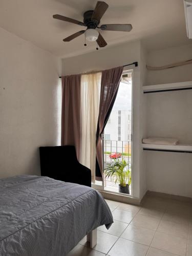 Postel nebo postele na pokoji v ubytování Cancun vacaciones en familia 3