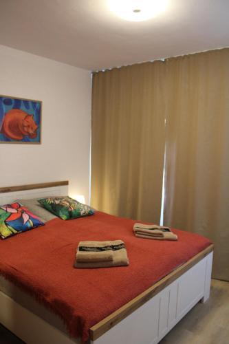 Ένα ή περισσότερα κρεβάτια σε δωμάτιο στο Sun Apartment
