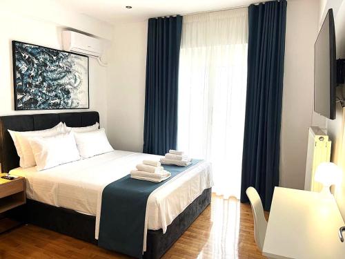 Postel nebo postele na pokoji v ubytování Athens Panoramic Penthouse