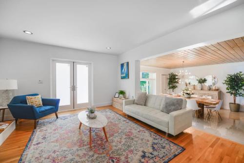 a living room with a couch and a table at Charming House with Private Pool n Coral Gable in Miami