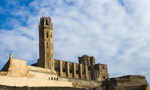 a building with a clock tower on top of it at Hotel Nadal in Lleida