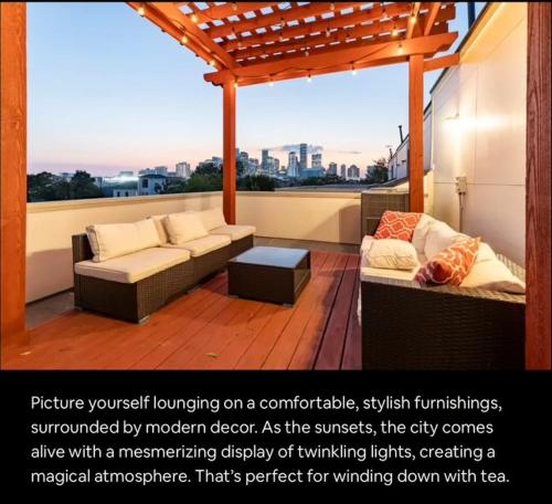 a living room with a couch and a table at Sophisticated Urban Retreat with Skyline Views home in Houston