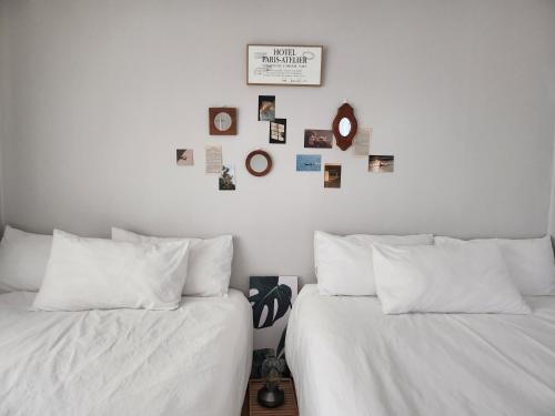 Ένα ή περισσότερα κρεβάτια σε δωμάτιο στο Gwang An Stay