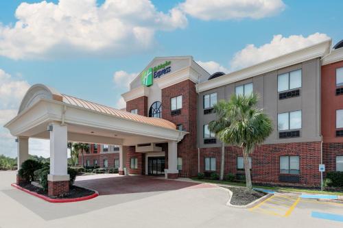 a rendering of the front of a hotel at Holiday Inn Express Hotel & Suites Winnie by IHG in Winnie