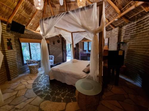 Postel nebo postele na pokoji v ubytování Eco Hotel Tahawi