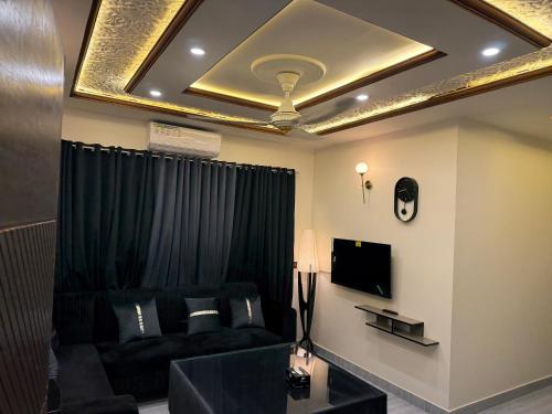 The Sapphire Suitesにあるテレビまたはエンターテインメントセンター