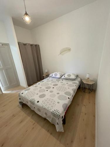 Katil atau katil-katil dalam bilik di LE PASTEL Superbe appartement Avignon