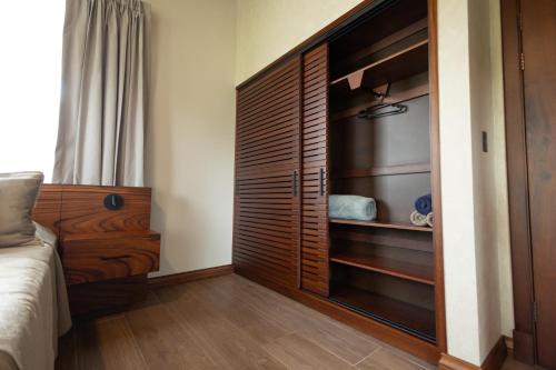 Ένα ή περισσότερα κρεβάτια σε δωμάτιο στο Villas Jawara ! Un Volcán en su Jardín !
