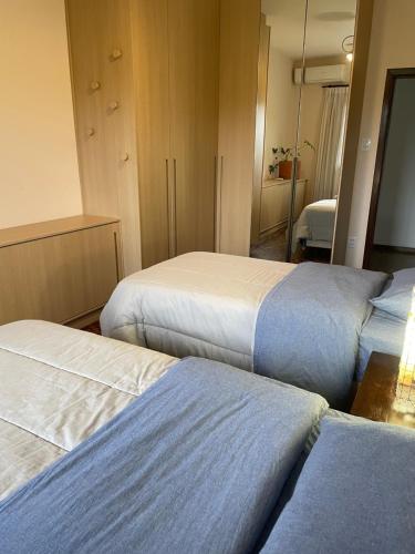 Ένα ή περισσότερα κρεβάτια σε δωμάτιο στο Apartamento tropical no centro de Pomerode
