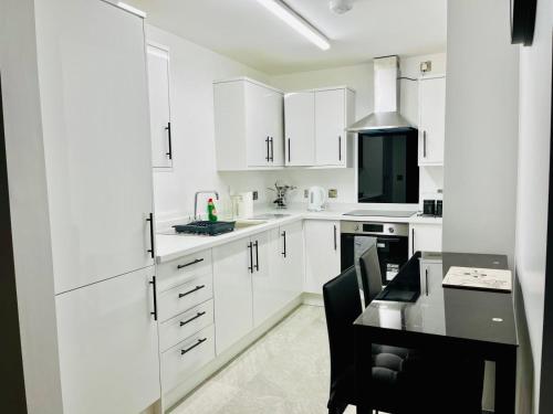 Η κουζίνα ή μικρή κουζίνα στο Cathedral Park Apartments