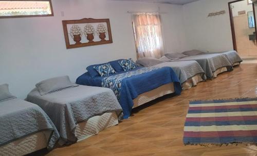 Una cama o camas en una habitación de Hotel Fazenda Chiminelli