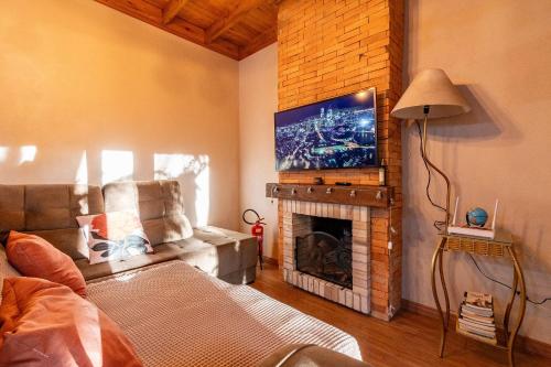 Μια τηλεόραση ή/και κέντρο ψυχαγωγίας στο Rosa Green House Canela