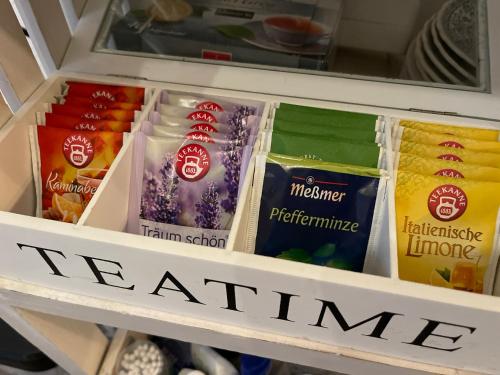a refrigerator filled with different types of food at 80qm Appartement, 3 Schlaf-Zimmer, integrierter Küche und Bad, 2min von A8, Garten mit Sitzgruppe, ruhig und modern in Irschenberg