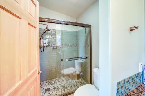 a bathroom with a glass shower with a toilet at Hot Tub, Fire Pit and Deck Chic Arizona Retreat in Pine