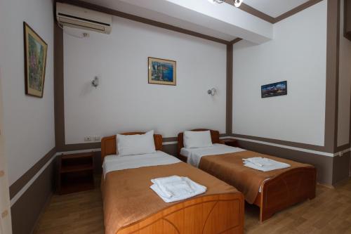 Katil atau katil-katil dalam bilik di Autogrill Hotel restaurant & Camping