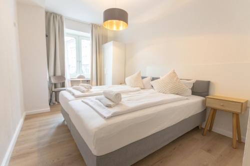 a bedroom with two beds in a room at Hotel Doerenkamp - Digital Access in Düsseldorf
