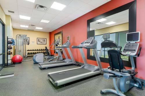 a gym with treadmills and ellipticals in a room at Best Western Plus St. Paul North/Shoreview in Shoreview