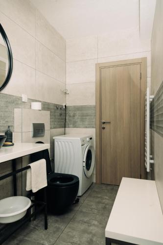 Postel nebo postele na pokoji v ubytování Rest Apartments