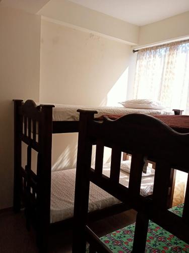 Llit o llits en una habitació de Paraíso del sol