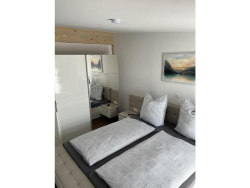 Ένα ή περισσότερα κρεβάτια σε δωμάτιο στο Amselnest Comfortable holiday residence