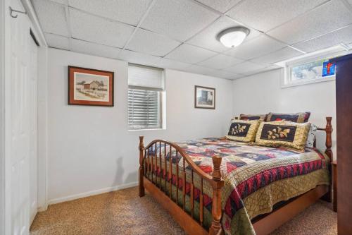 a bedroom with a bed in a room at Country Club View in Marion, Iowa in Marion