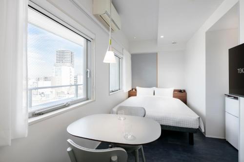 池袋東急Stay酒店房間的床