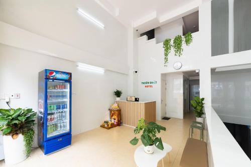 an office with a vending machine in a room at Thiên Quốc Hotel in Ho Chi Minh City