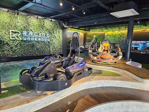 a exhibit of a racing motorcycle on a track at Mimpi Muji Gamuda Cove in Pulau Kempas