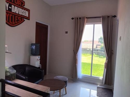 Χώρος καθιστικού στο House Of Elea SYARIAH