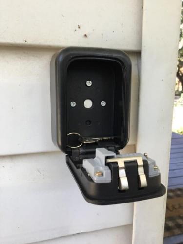 a black box on the side of a wall at Perfectly Modern Craftsman- close to everything! in Mobile