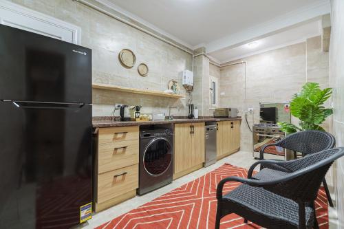 Kuchyň nebo kuchyňský kout v ubytování Nabeel Homes Boutique Hotel