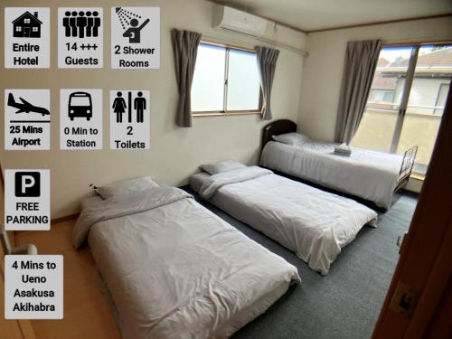 three beds in a room with signs on the wall at Entire Hotel Beside Asakusa, Ueno, Akihabara and Tokyo Skytree tower between 3 Train Stations and Contains 3 Bedrooms, 2 Bathrooms and 2 toilets for 14 guests in Tokyo
