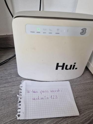 a box with a notebook sitting next to a toilet at Appartement City Center in Vienna