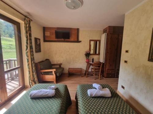 Postel nebo postele na pokoji v ubytování Park Hotel Gran Bosco