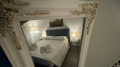 Katil atau katil-katil dalam bilik di Trastevere Welcome Home Deluxe