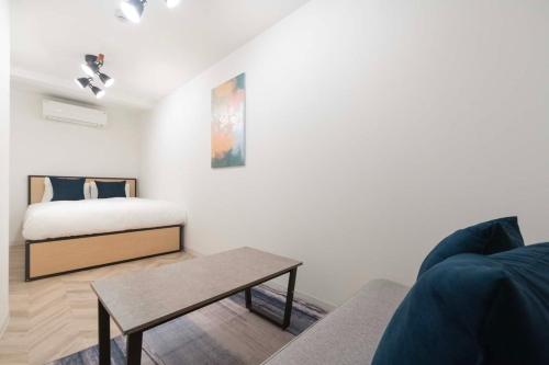 Ένα ή περισσότερα κρεβάτια σε δωμάτιο στο CONTEL Meidaimae