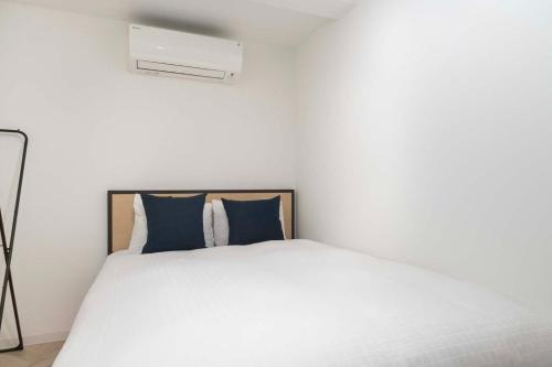 Ένα ή περισσότερα κρεβάτια σε δωμάτιο στο CONTEL Meidaimae