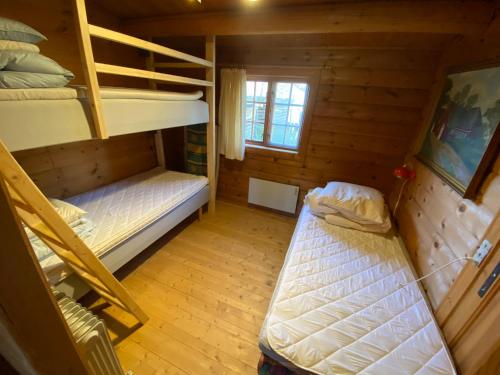 an overhead view of a bedroom with bunk beds at Log-House Wildernest in Brande