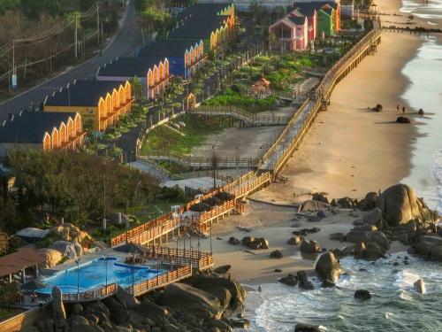an aerial view of the beach at the disneyland resort at Trân Châu Beach & Resort in Ba Ria