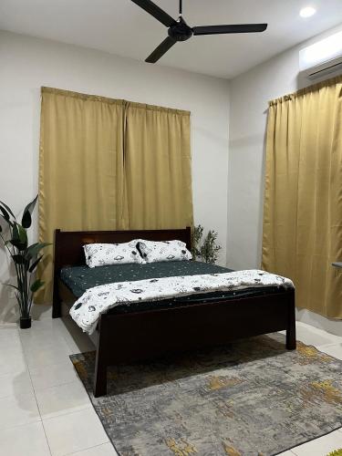 Giường trong phòng chung tại Bukit Tinggi Homestay, Kepala Batas, Kedah