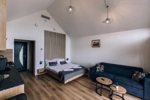 Postel nebo postele na pokoji v ubytování Wine Resort Mak
