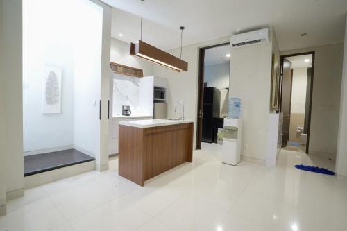 Koupelna v ubytování DnD-2 Villa Nivata Ciputra Beach Resort