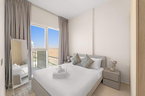 Aesthetic 1BR with Sofa Bed, Access to Pool & Gym