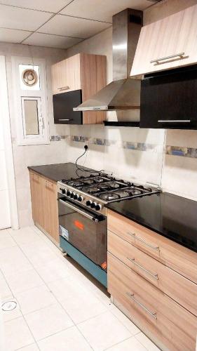 Køkken eller tekøkken på Beach Star Residency