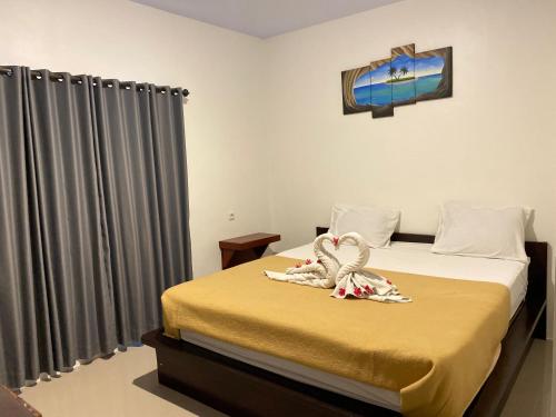 Postel nebo postele na pokoji v ubytování Eternal Rooms