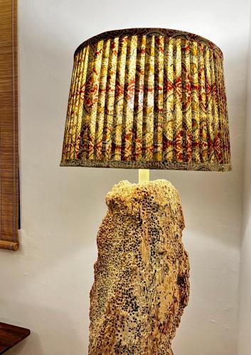 a lamp with a rock on top of it at Janice Villa Arambol in Arambol