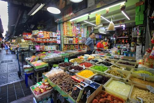 a market with a variety of fruits and vegetables at CASA Yaowarat Road ถนนเยาวราช Pro in Samphanthawong
