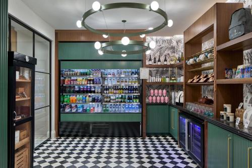 a grocery store aisle with a soda shop at La Concha Key West, Autograph Collection in Key West