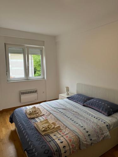 Postel nebo postele na pokoji v ubytování Olimp apartmani Sokobanja