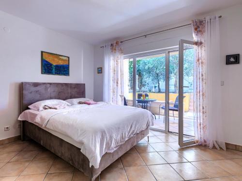 Posteľ alebo postele v izbe v ubytovaní Apartment Vivoda by Interhome